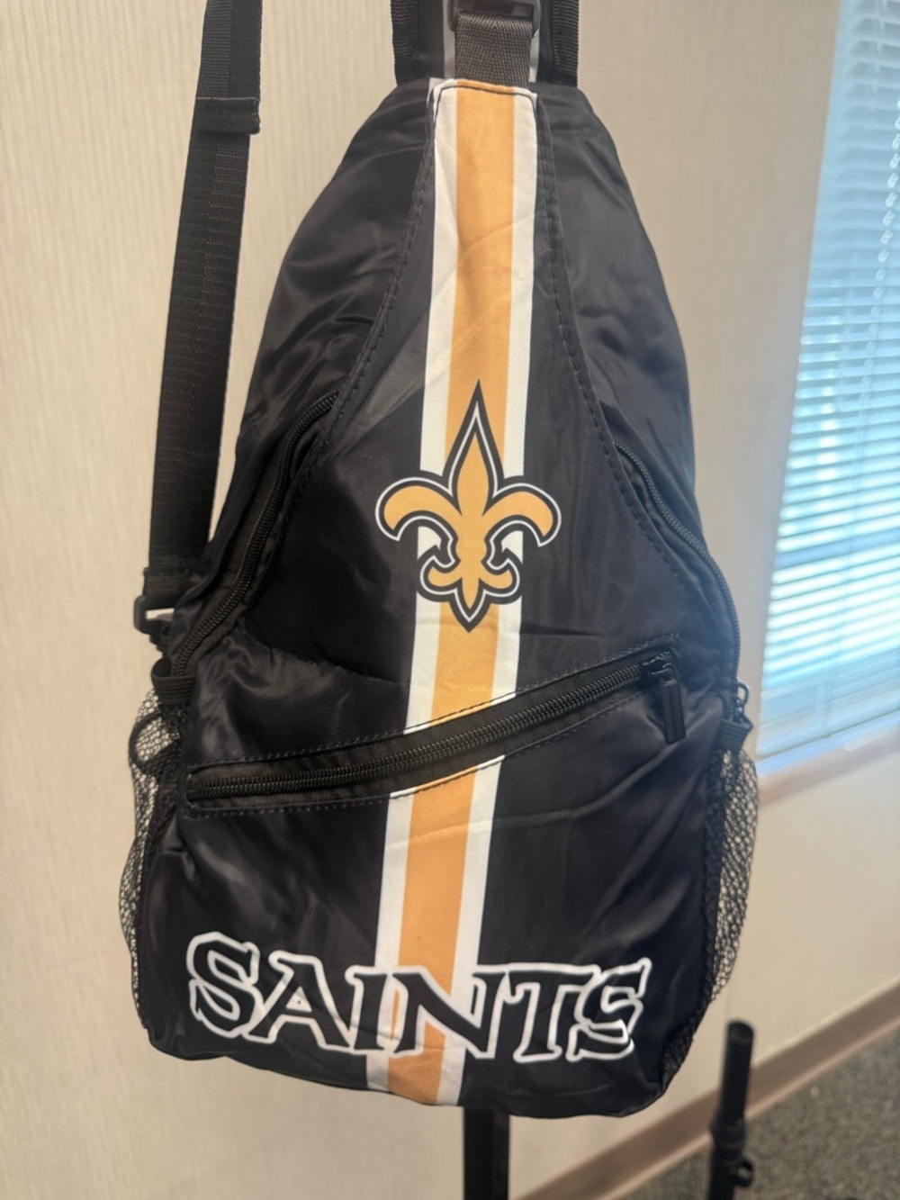 New Orleans Saints Black Sling Backpack with Gold Stripe